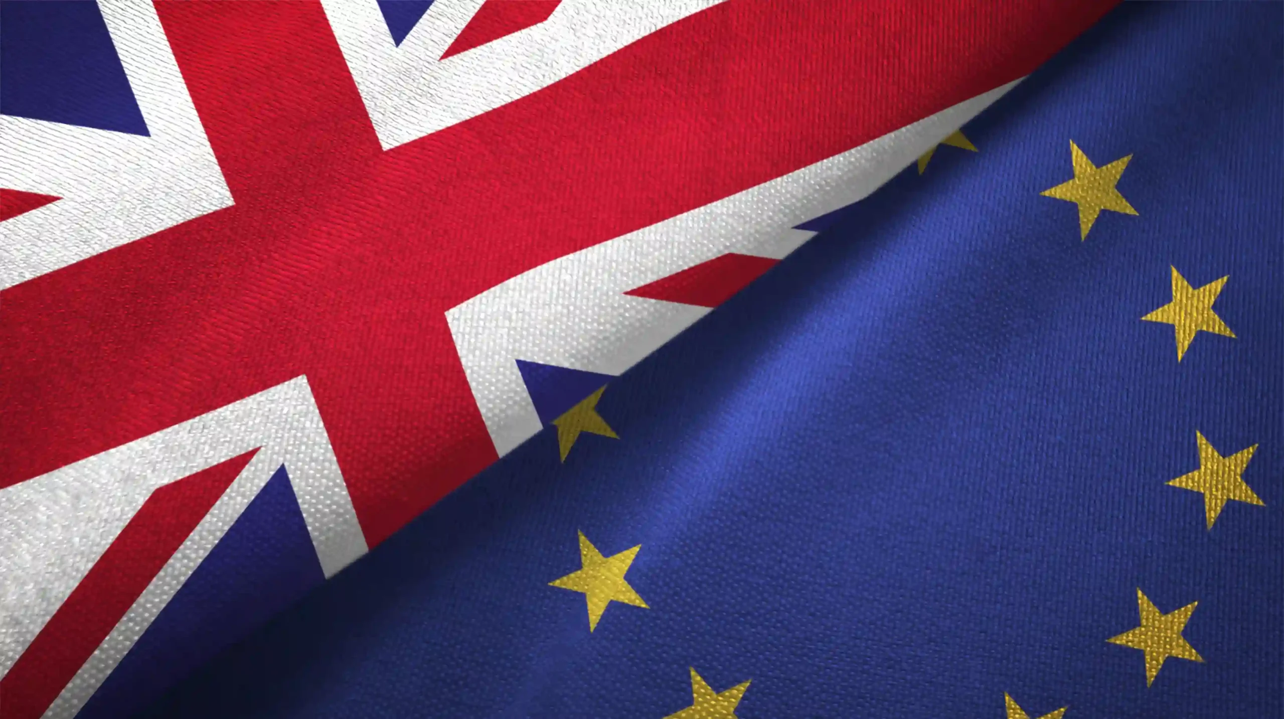 European Union and United Kingdom flags joined together, symbolising privacy and regulatory alignment.